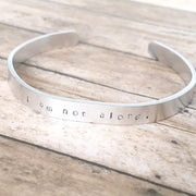 I am not alone hand stamped affirmation bangle bracelet